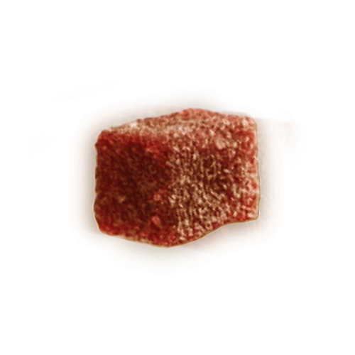 Red, sugar-coated, square jelly candy on a black background.